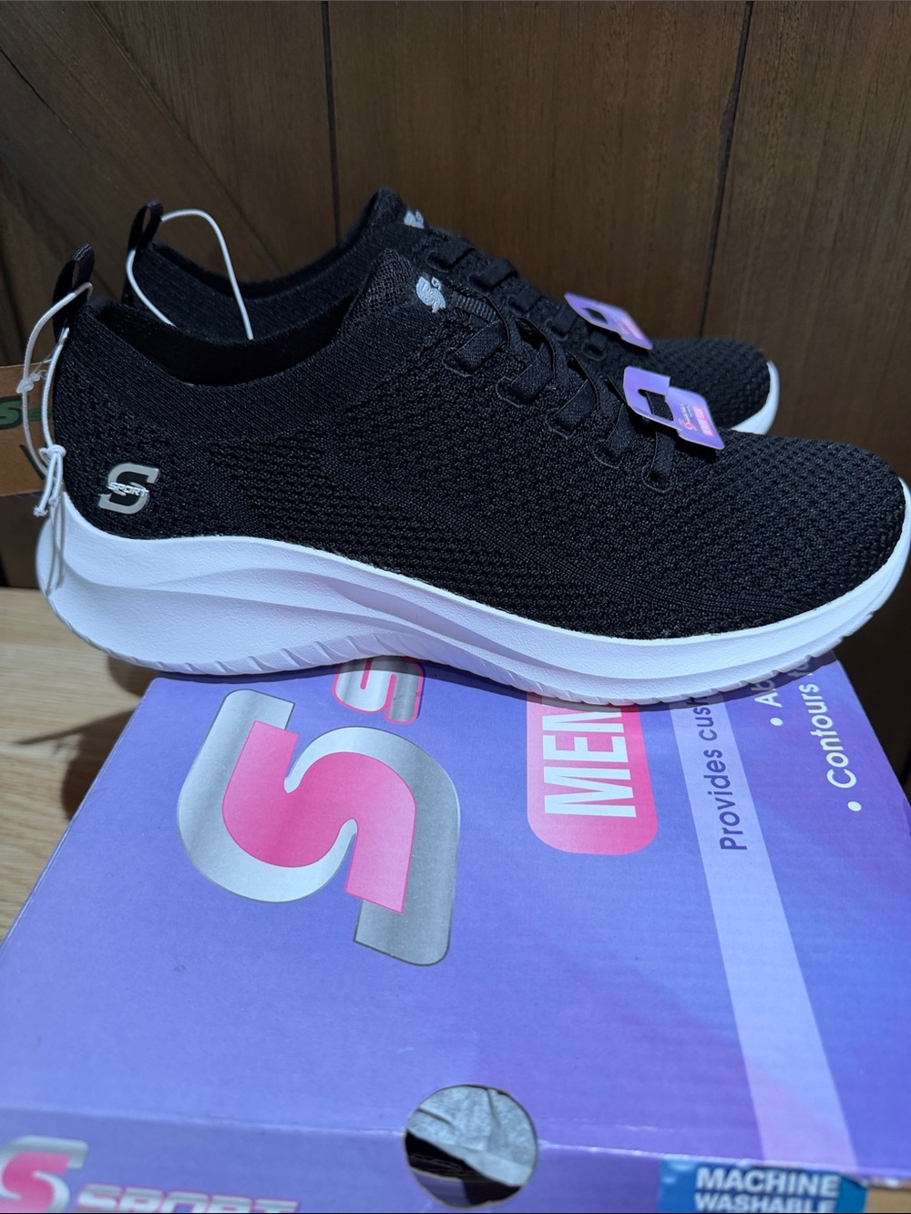 Skechers Women’s Black Knit Slip-On Sneakers with White Sole